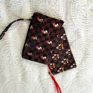 Disney: NWOT Mickey and Mini wristlets.